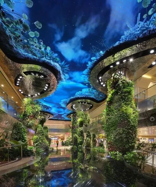 Indoor rainforest and digital sky at Singapore Changi Airport – Singapore Tour Packages