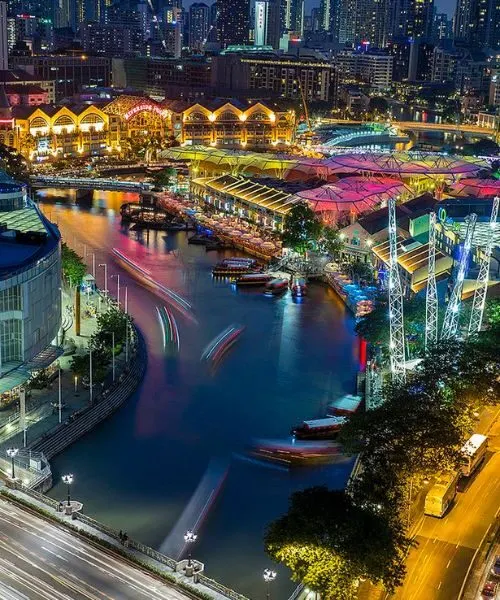 Colorful Clarke Quay nightlife by the river in Singapore – Singapore Tour Packages