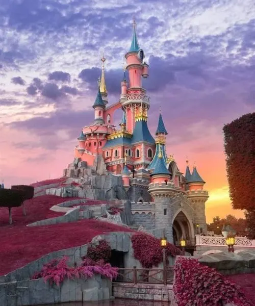 Magical Disneyland castle at sunset, perfect for family vacations with Europe tour packages.