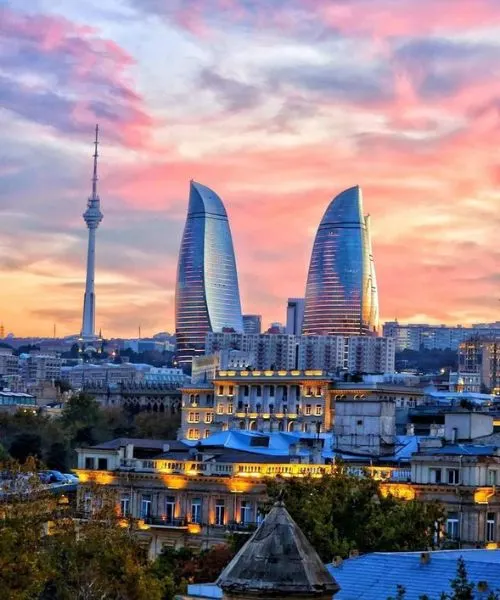 Flame Towers and Baku city skyline at sunset – experience stunning views with Baku Tour Packages from Lucknow.