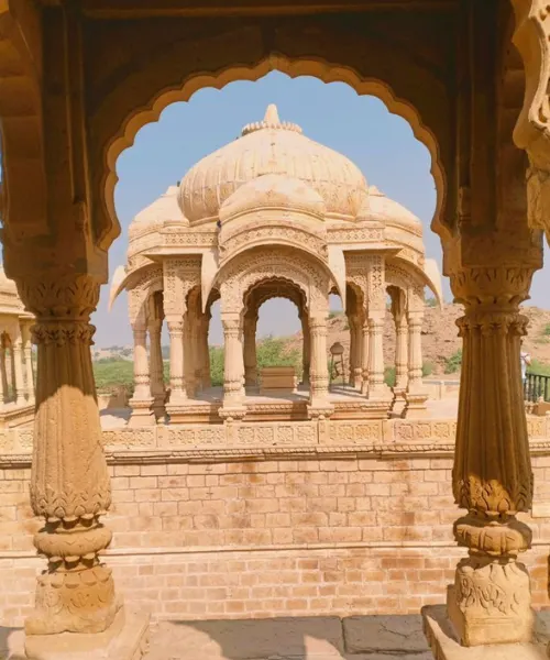 Historic royal cenotaph in Jaipur showcasing intricate Rajasthani architecture, a heritage sightseeing spot often included in a Jaipur tour package.